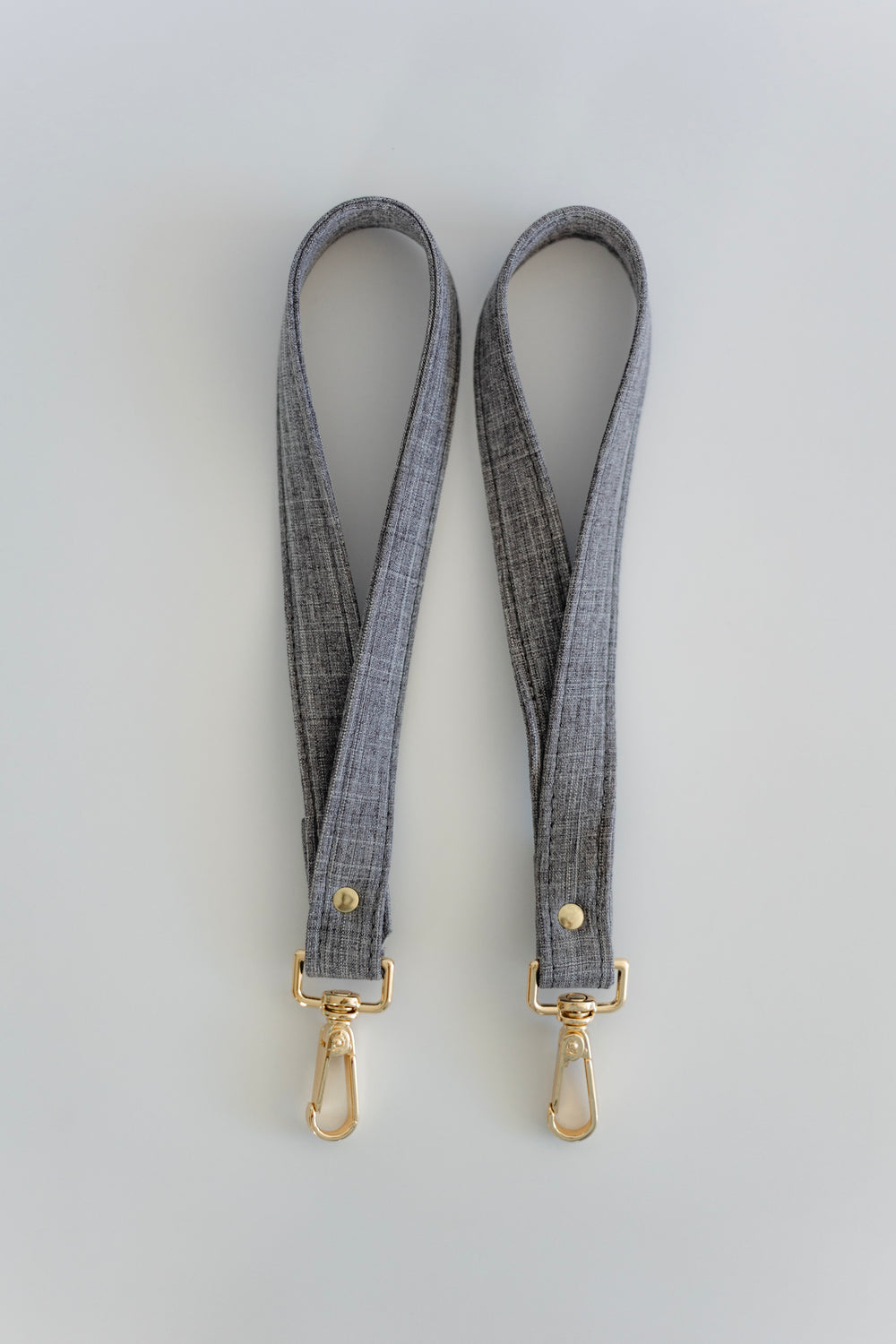 Asa de cochecito lino gris