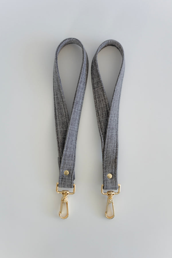 Asa de cochecito lino gris