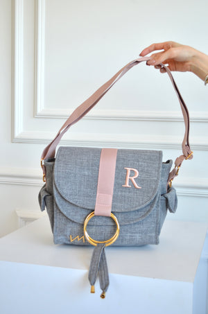 Bolso Louise Mini Glam lino gris con cinta rosé inicial R OUTLET